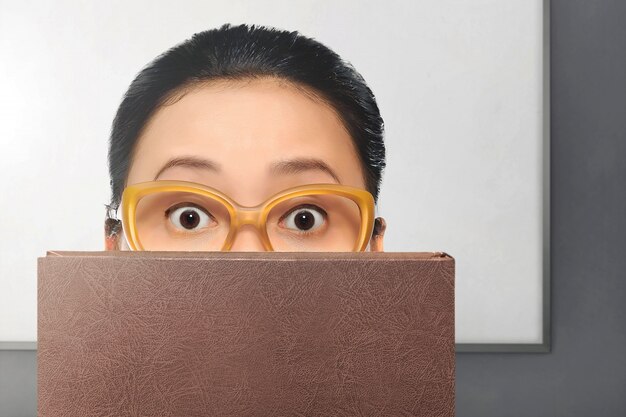 Young asian woman with glasses 