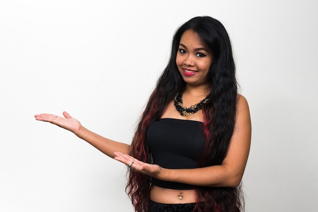 young Asian woman with long hair on white