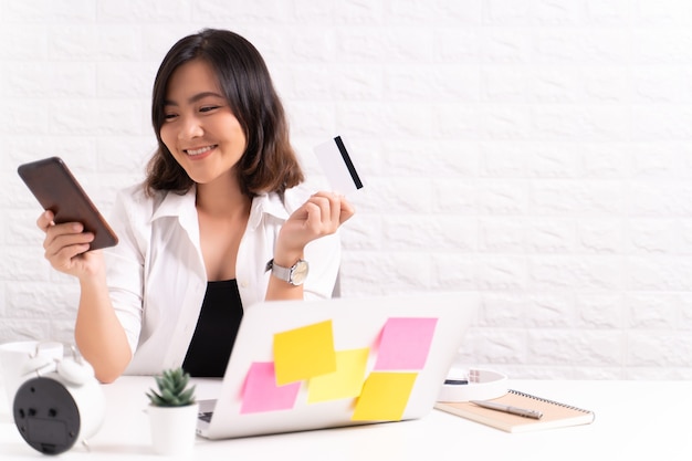 Young asian woman working on a laptop