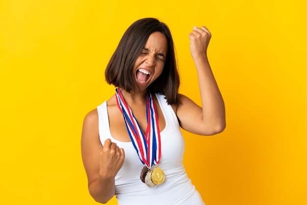 Young asiatic woman with medals isolated