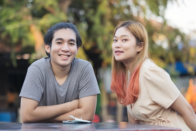 Young asis couple talking outdoor