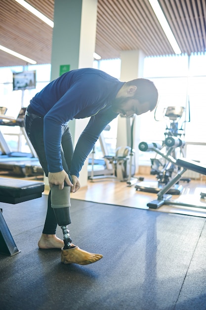 Young athlete in health club