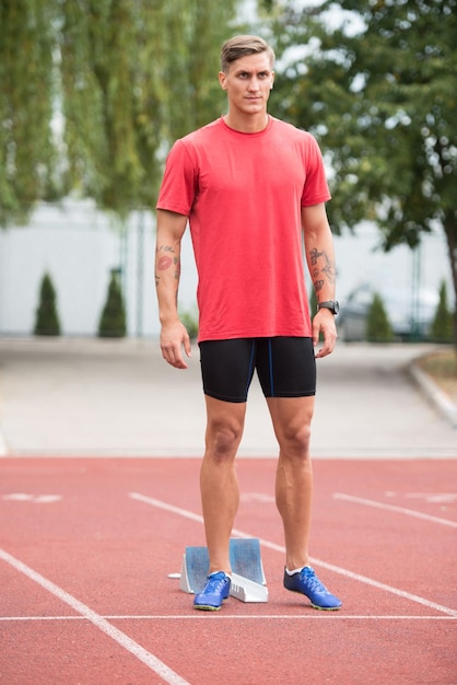 Young Athlete on Running Track