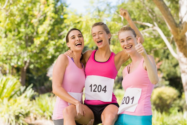 Young athlete women cheering after victory