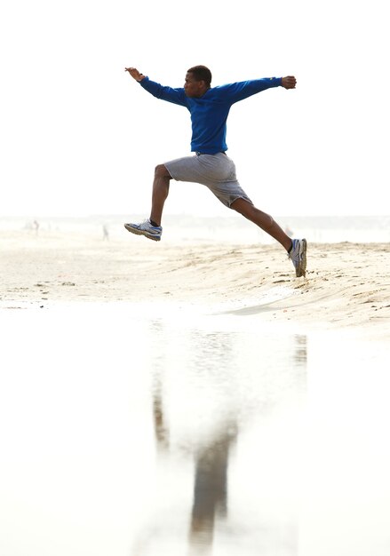 Young athletic male running