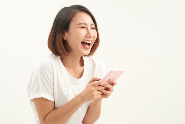 Young attractive asian woman to see a smart phone