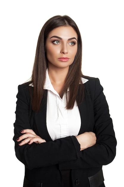 Young attractive model in business black suit standing in studio