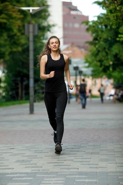 Young attractive woman running