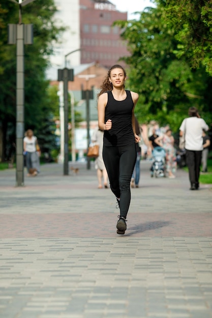 Young attractive woman running