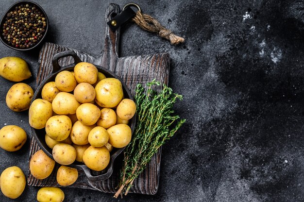 Young baby Potatoes in a pan