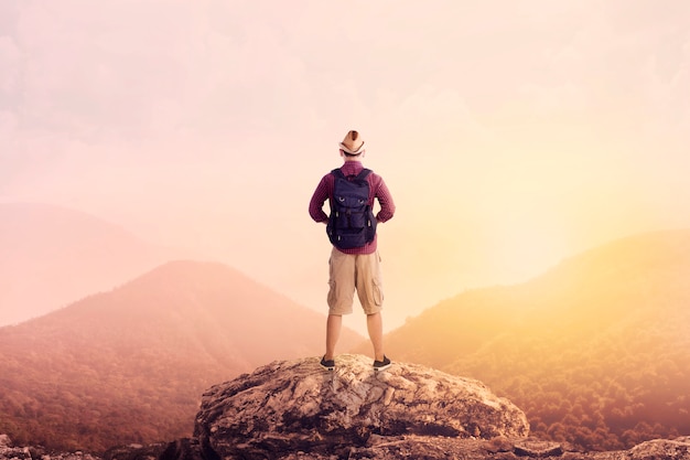 Young Backpacker Enjoying A Valley View