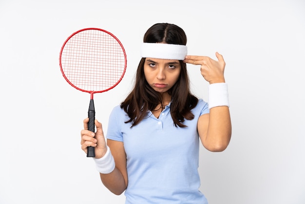 Young badminton player woman isolated