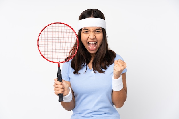 Young badminton player woman isolated