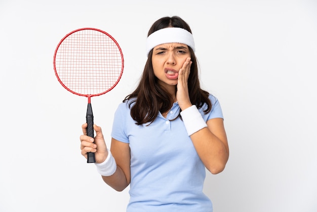 Young badminton player woman isolated