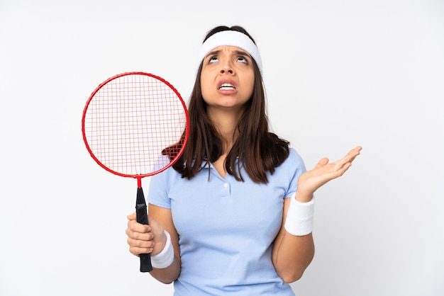 Young badminton player woman isolated