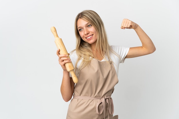 Young bakery woman isolated on white