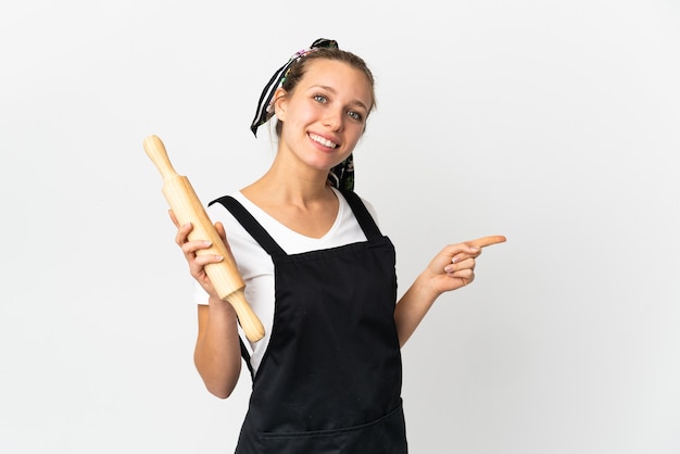 Young bakery woman isolated on white