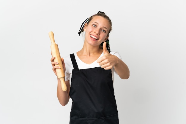 Young bakery woman isolated on white