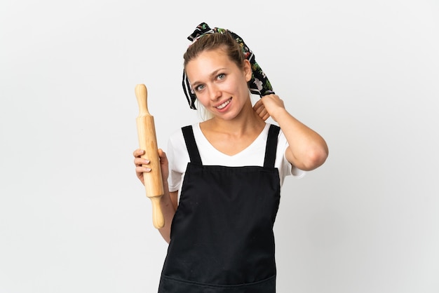 Young bakery woman isolated on white