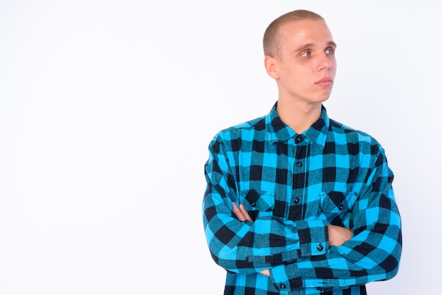 young bald hipster man isolated against white wall