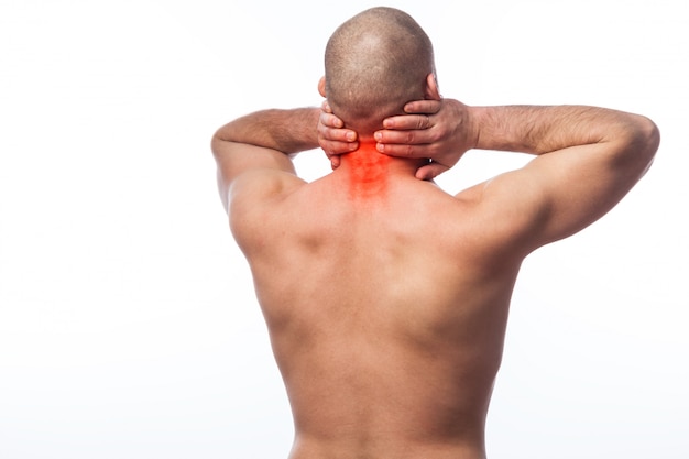 Young bald man sportive physique stretched neck