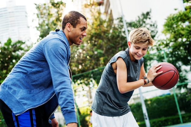 Young basketball player shoot