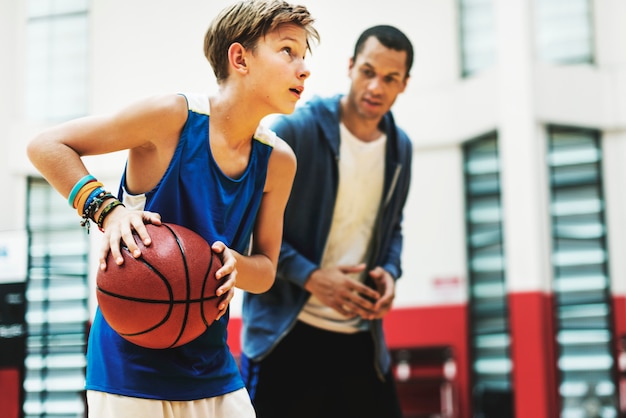 Young basketball player shoot