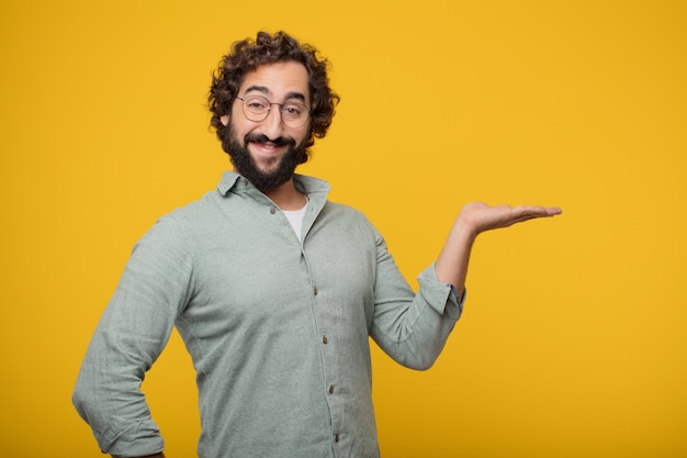 Young bearded businessman expressing a concept 