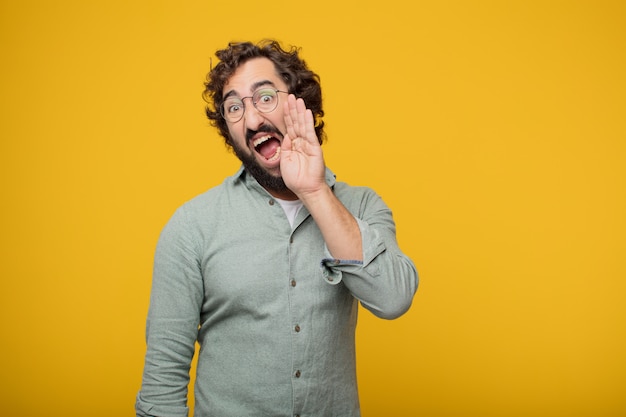 Young bearded businessman expressing a concept 