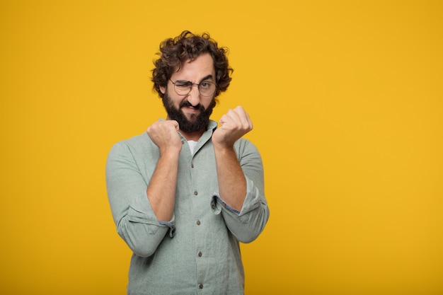 Young bearded businessman expressing a concept 