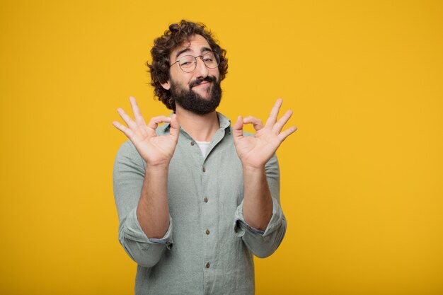 Young bearded businessman expressing a concept 