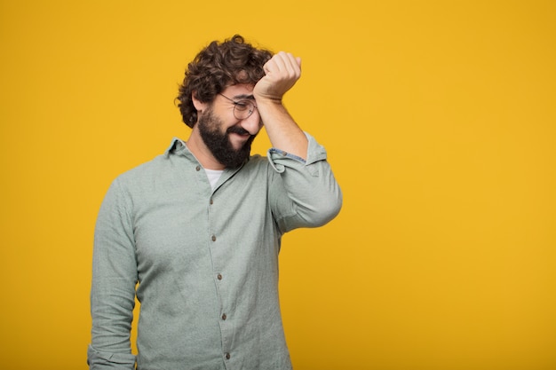 Young bearded businessman expressing a concept 