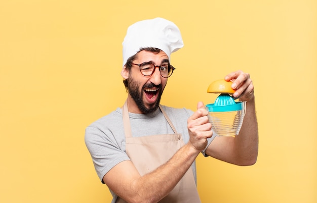 Young bearded chef man happy expression