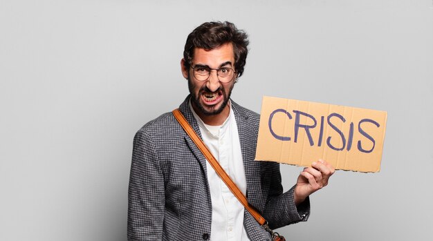 Photo young bearded crazy man. crisis concept