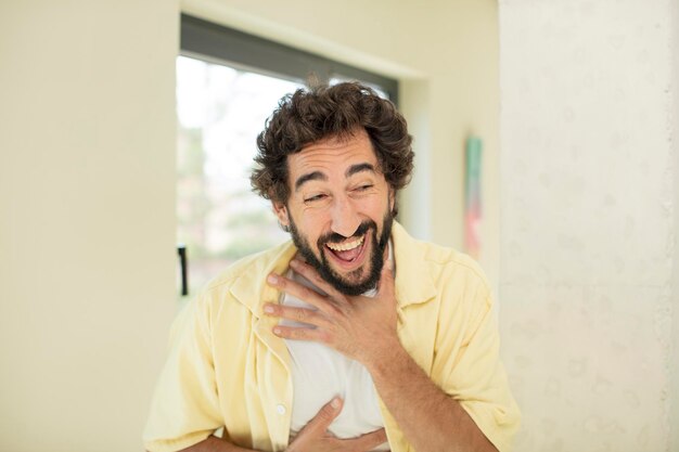 young bearded crazy man expressing a concept