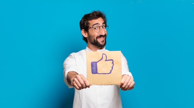 Young bearded crazy man holding a social media like banner