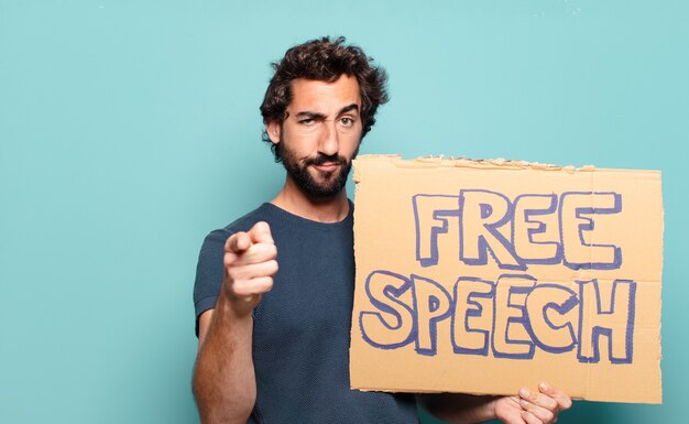 Photo young bearded man free speech concept