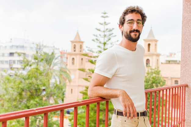 Young bearded man relaxing at home