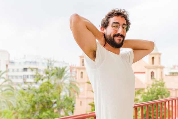 Young bearded man relaxing at home