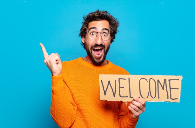 Photo young bearded man welcome concept