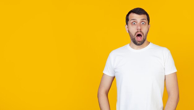 Young bearded man in a white t-shirt