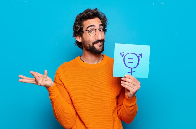 Young bearded man with gender freedom board