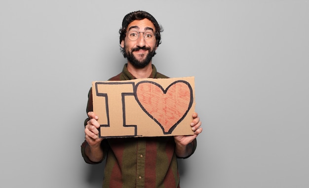 Young bearded man with I love banner