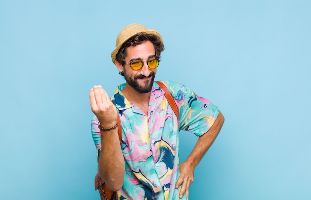 Young bearded tourist man making gesture