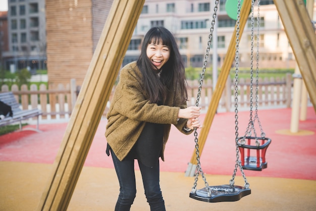 young beautiful asian hipster woman