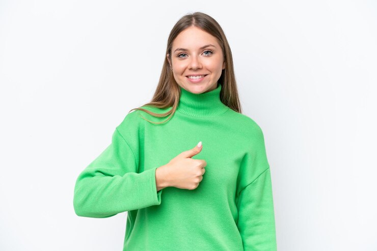 Photo young beautiful blonde woman isolated on white background giving a thumbs up gesture
