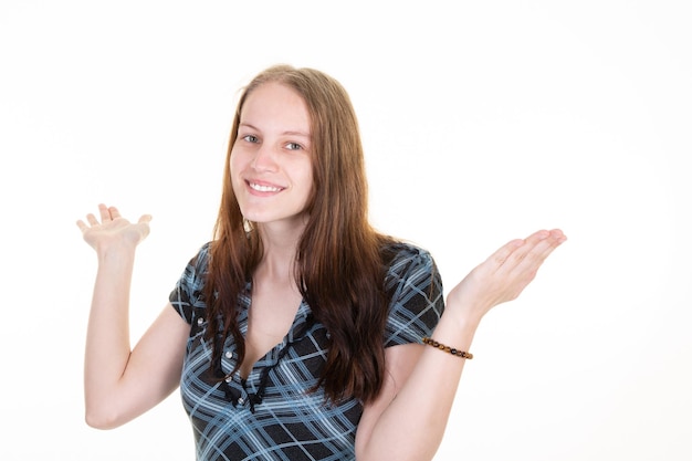 Young beautiful blonde woman smiling surprised with both hands up disillusioned