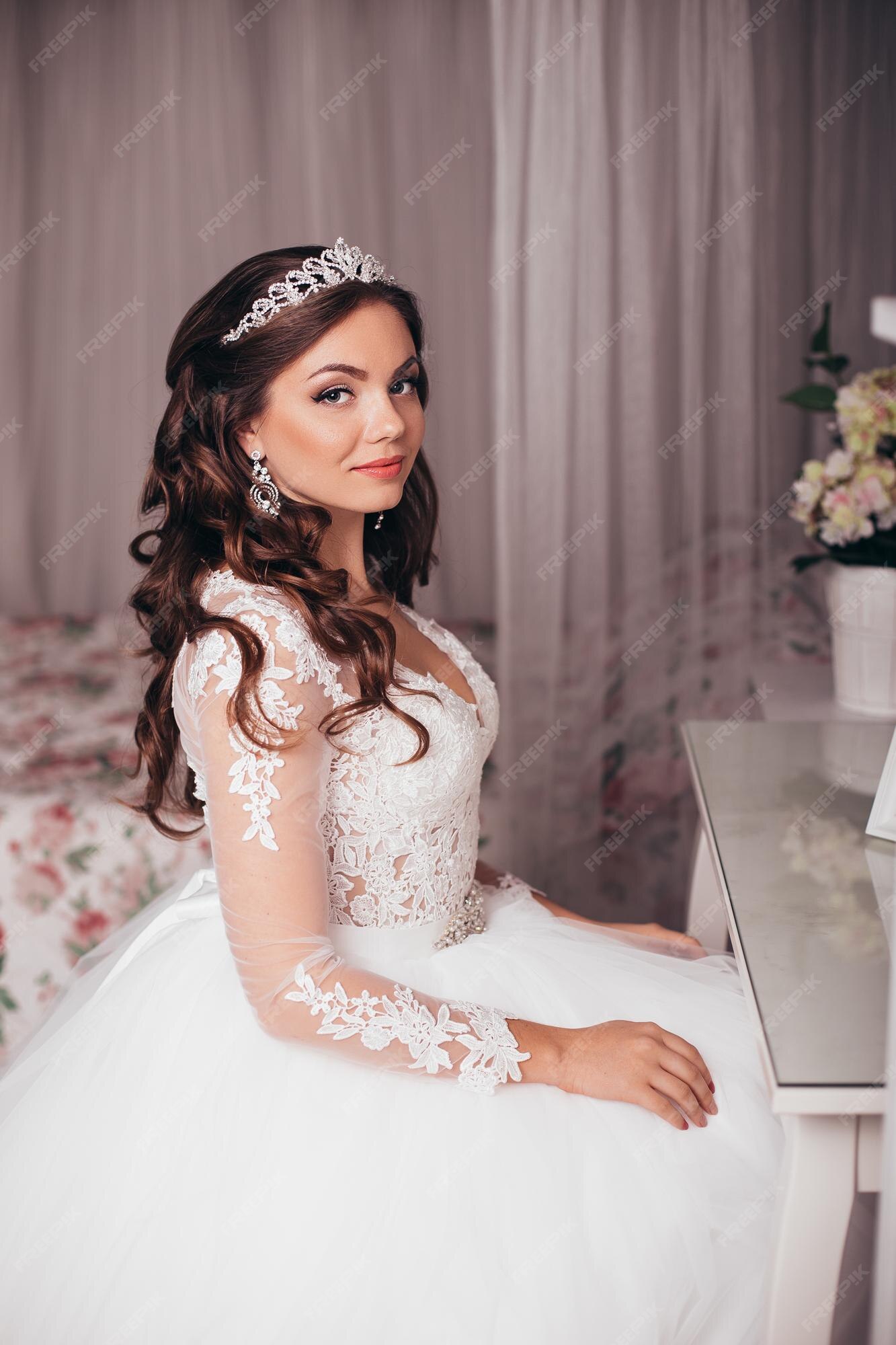 Premium Photo | Young beautiful bride with brunette wedding hairstyle and makeup Premium Photo | Young beautiful bride with brunette wedding hairstyle and makeup