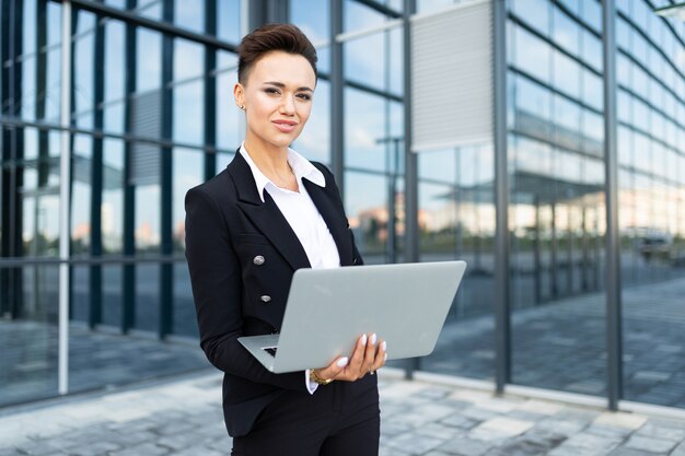 Young beautiful businesswoman posing