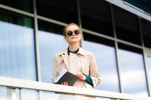 Young beautiful businesswoman with sunglasses